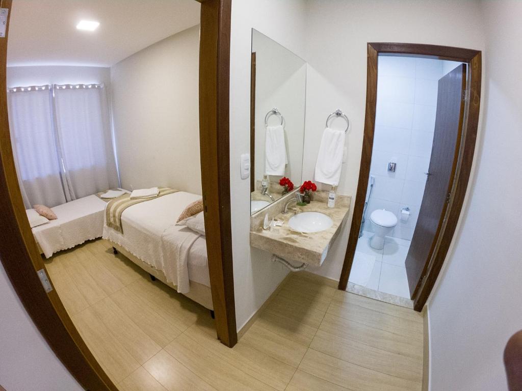 Postel nebo postele na pokoji v ubytování Le Parc Hotel