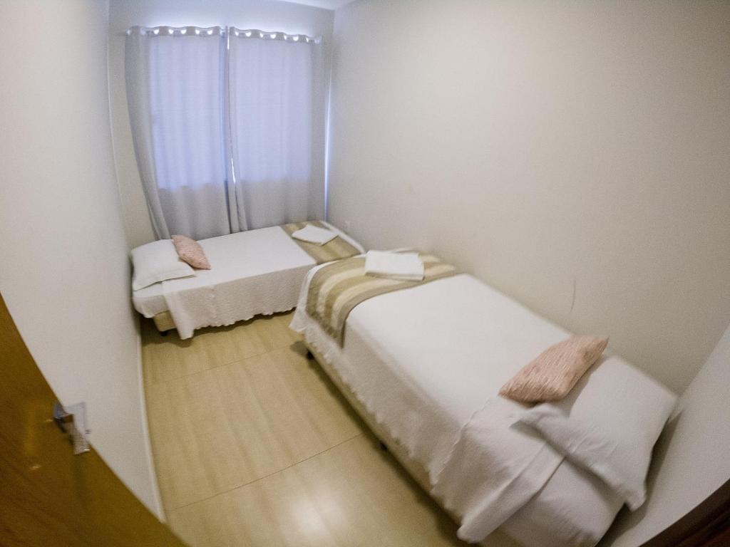 Postel nebo postele na pokoji v ubytování Le Parc Hotel