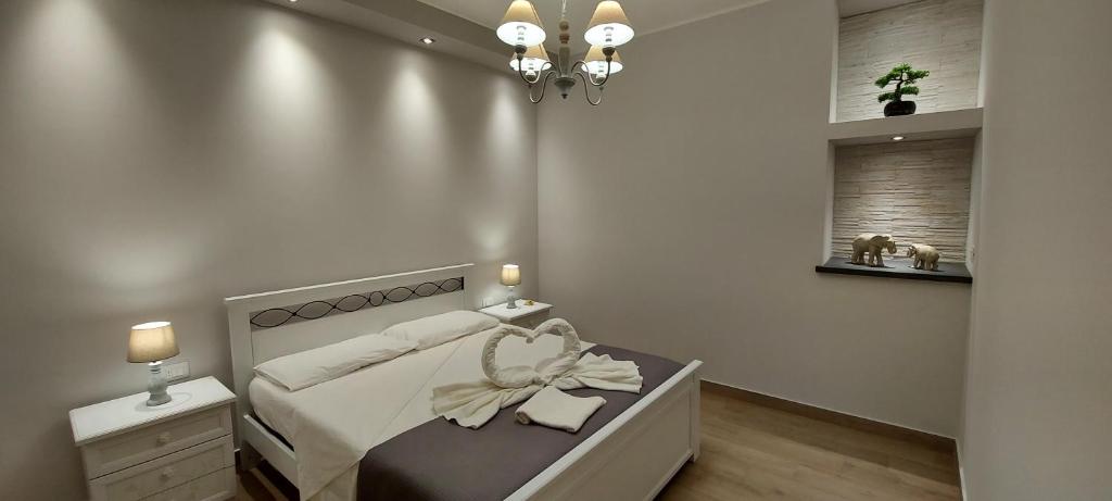 Posteľ alebo postele v izbe v ubytovaní Casa Parisi