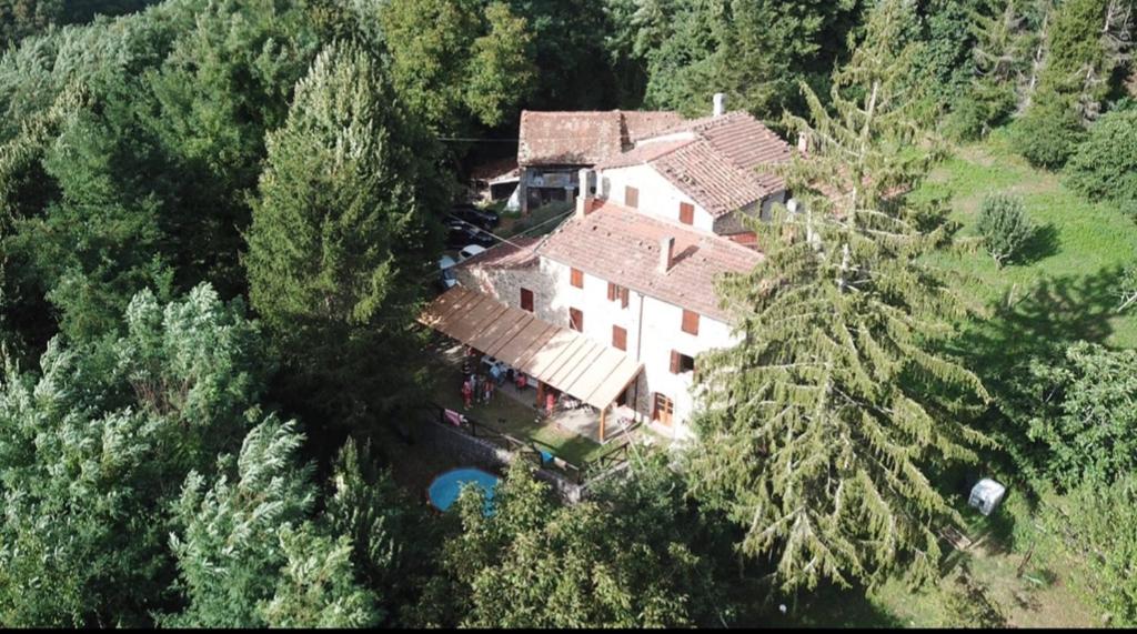 an aerial view of a large house in the woods at Villa Terria in Bagni di Lucca
