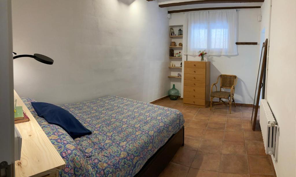 Cama o camas de una habitación en Cal Pere de L'Onclet