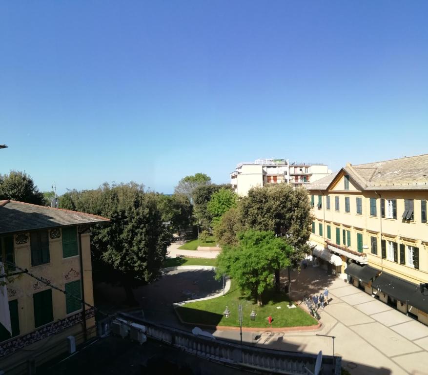 a view of the campus from the balcony of a building at ROMANTIC APARTMENT NEAR THE SEA with PRIVATE GARAGE ctr zero undici zero diciassette cav 038 in Levanto