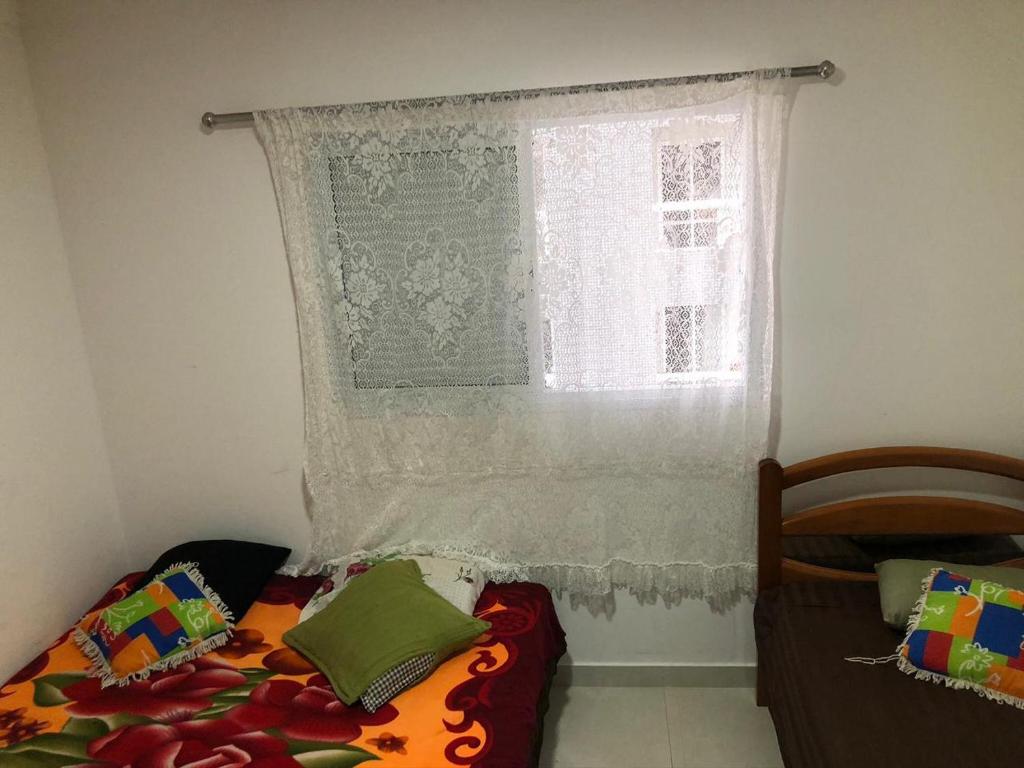  APTO EM FRENTE A PRAIA 02 DORMS PRAIA GRANDE -BOQUEIRÃO