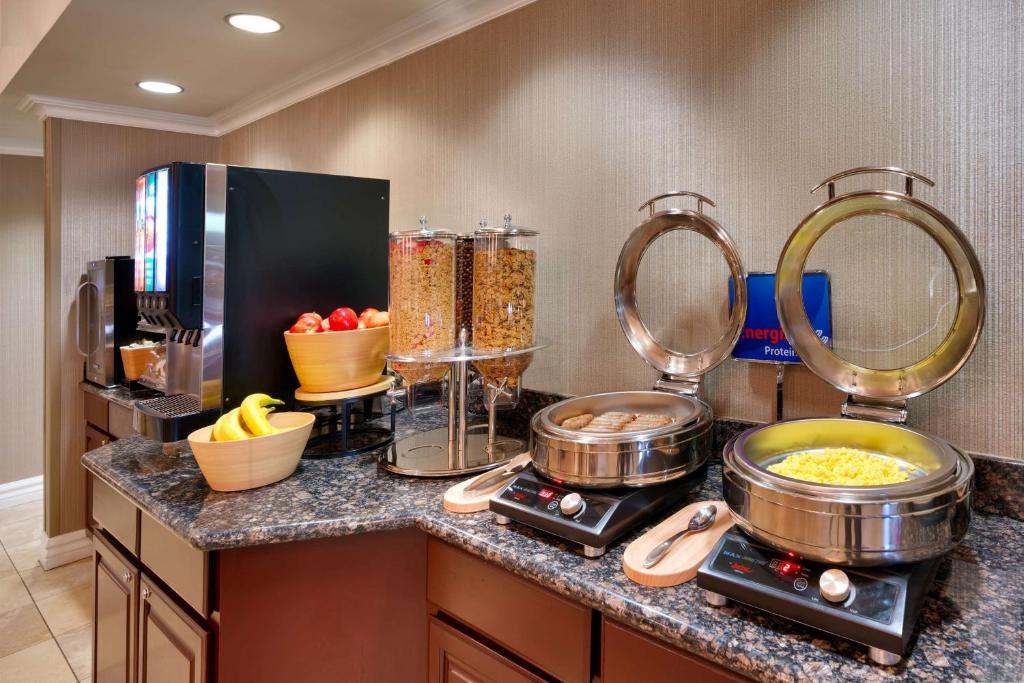 a kitchen with some food on a counter at Best Western Downtown Phoenix in Phoenix