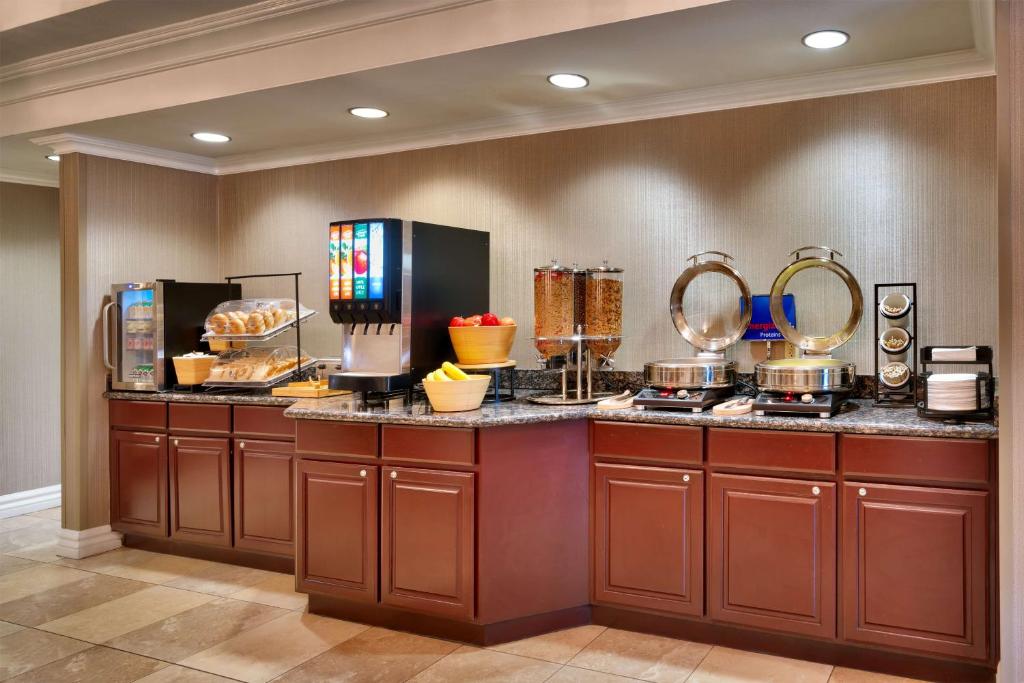 a kitchen with a counter with some food on it at Best Western Downtown Phoenix in Phoenix