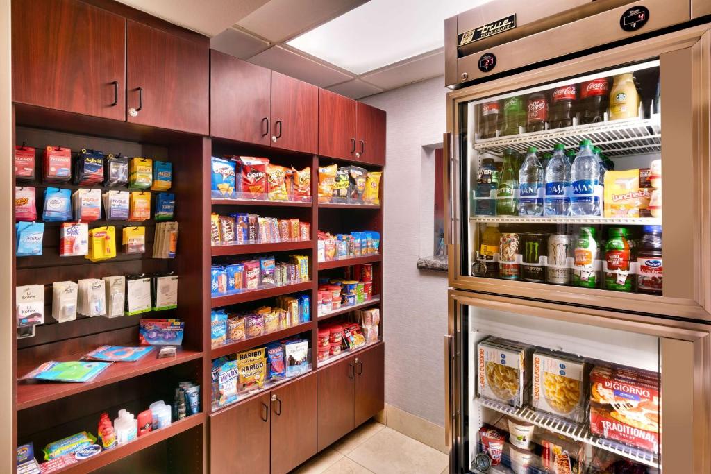 a grocery store with a refrigerator and lots of food at Best Western Downtown Phoenix in Phoenix