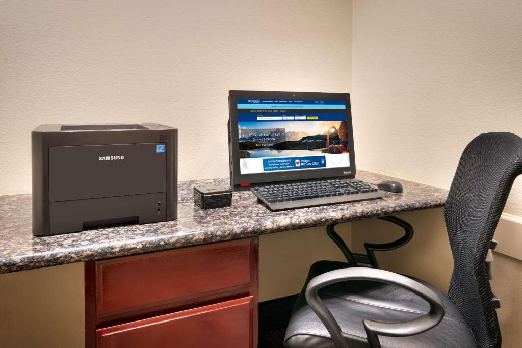 a laptop computer sitting on top of a desk at Best Western Downtown Phoenix in Phoenix