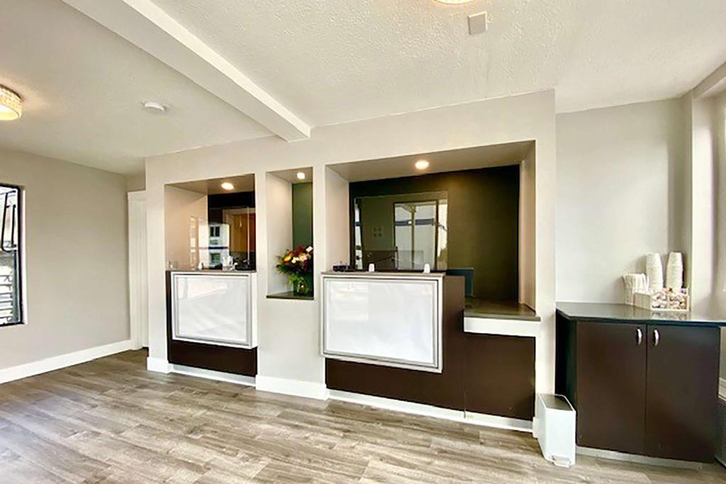a hair salon with two sinks in a room at Travelodge Inn & Suites by Wyndham Missoula University Park in Missoula