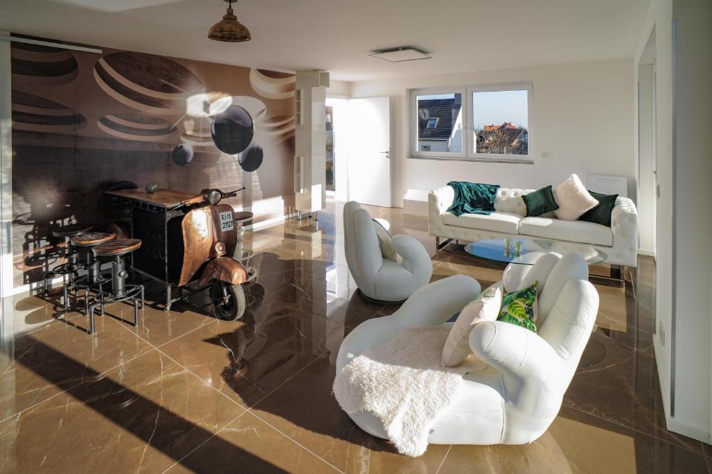 Posezení v ubytování Designapartments Sweet Home - Sennhütte 11