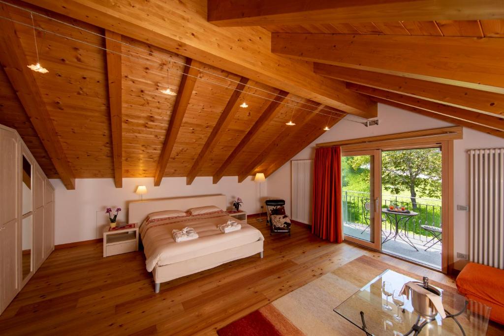 Postel nebo postele na pokoji v ubytování Albergo Edelweiss - LareSpa