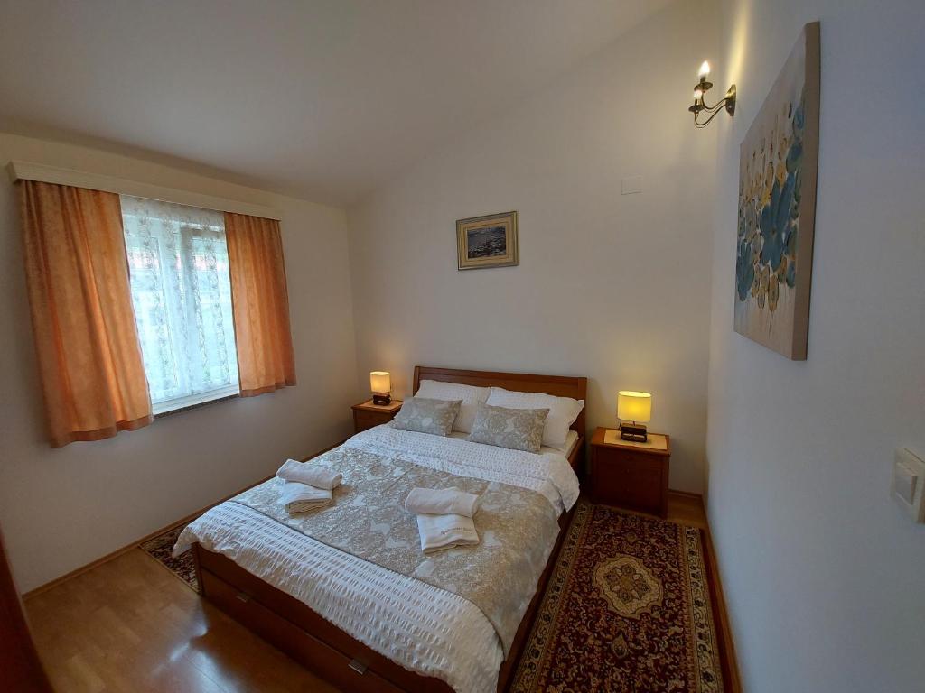Posteľ alebo postele v izbe v ubytovaní Apartments Palić