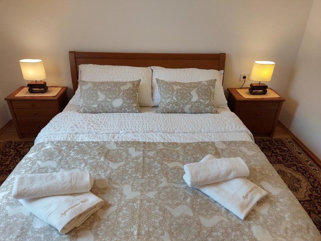 Posteľ alebo postele v izbe v ubytovaní Apartments Palić