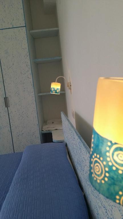 Postel nebo postele na pokoji v ubytování Le poste di Simplicio