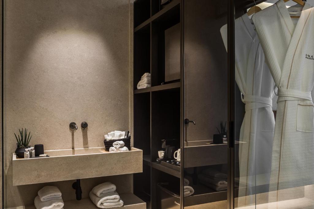 Koupelna v ubytování Canale Hotel & Suites