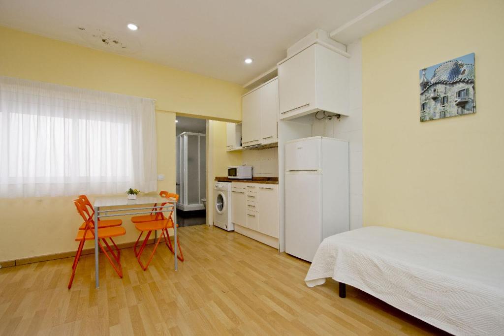 Kuchyň nebo kuchyňský kout v ubytování Barcelona City Apartment