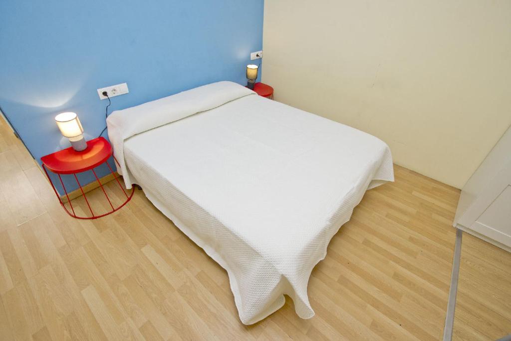 Postel nebo postele na pokoji v ubytování Barcelona City Apartment