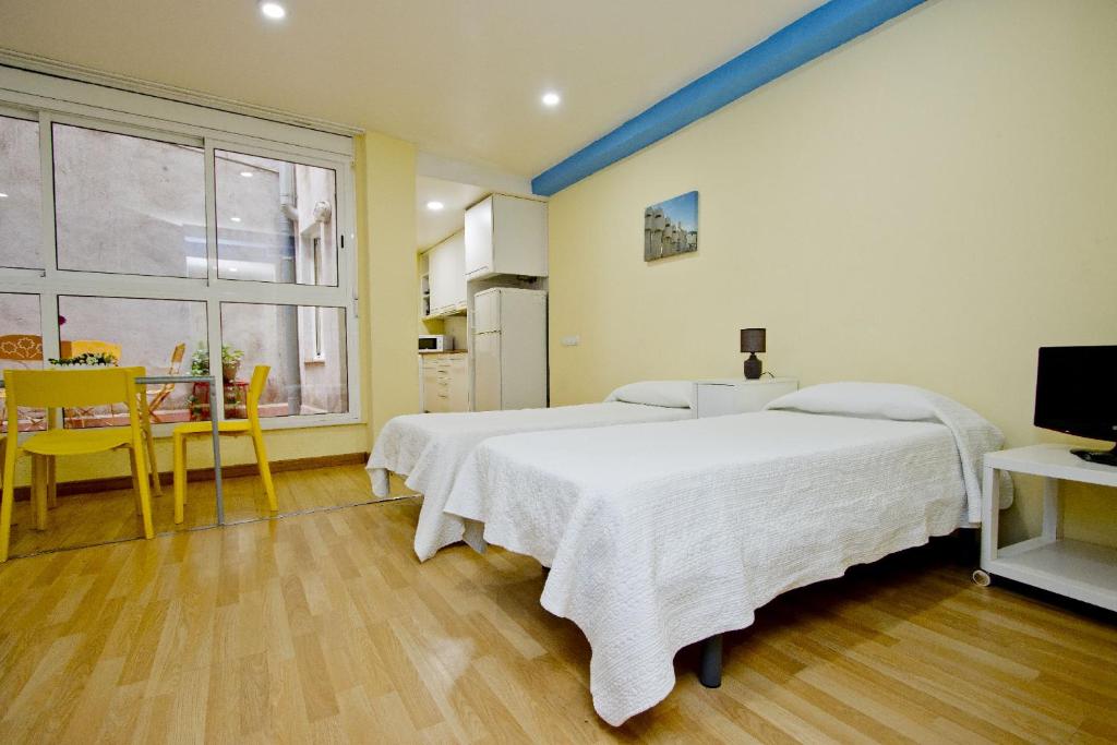 Postel nebo postele na pokoji v ubytování Barcelona City Apartment