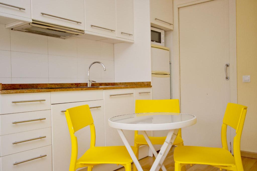 Kuchyň nebo kuchyňský kout v ubytování Barcelona City Apartment