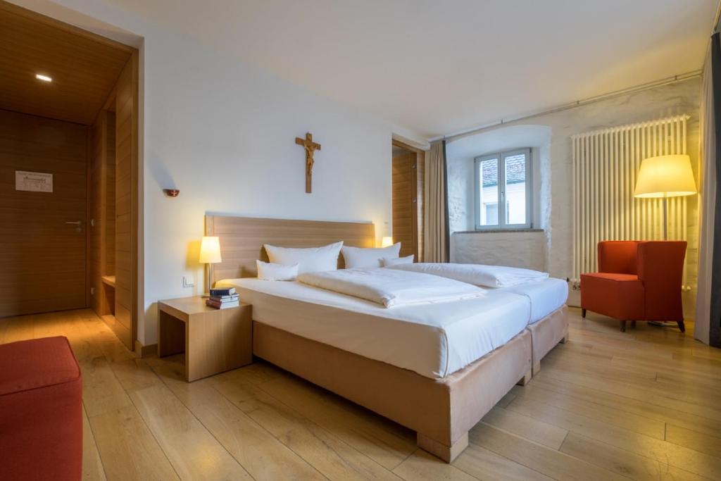 Postel nebo postele na pokoji v ubytování Haus St. Joseph