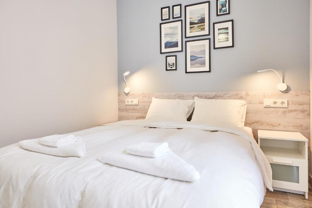 Postel nebo postele na pokoji v ubytování Espanatour APARTHOTEL 3
