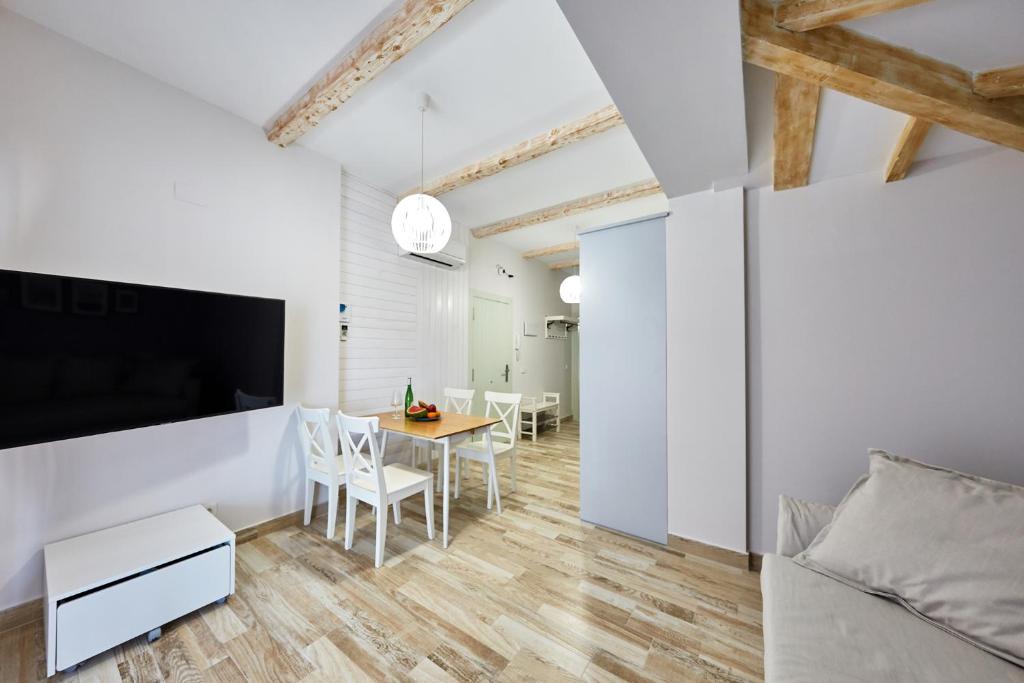 TV a/nebo společenská místnost v ubytování Espanatour APARTHOTEL 3