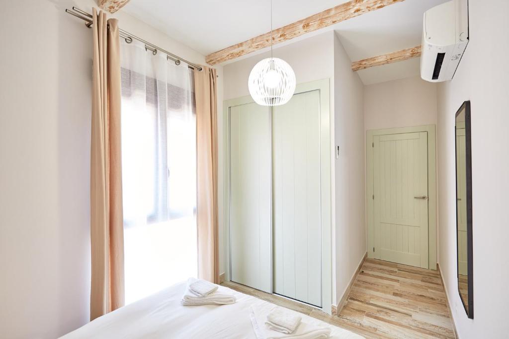 Postel nebo postele na pokoji v ubytování Espanatour APARTHOTEL 3