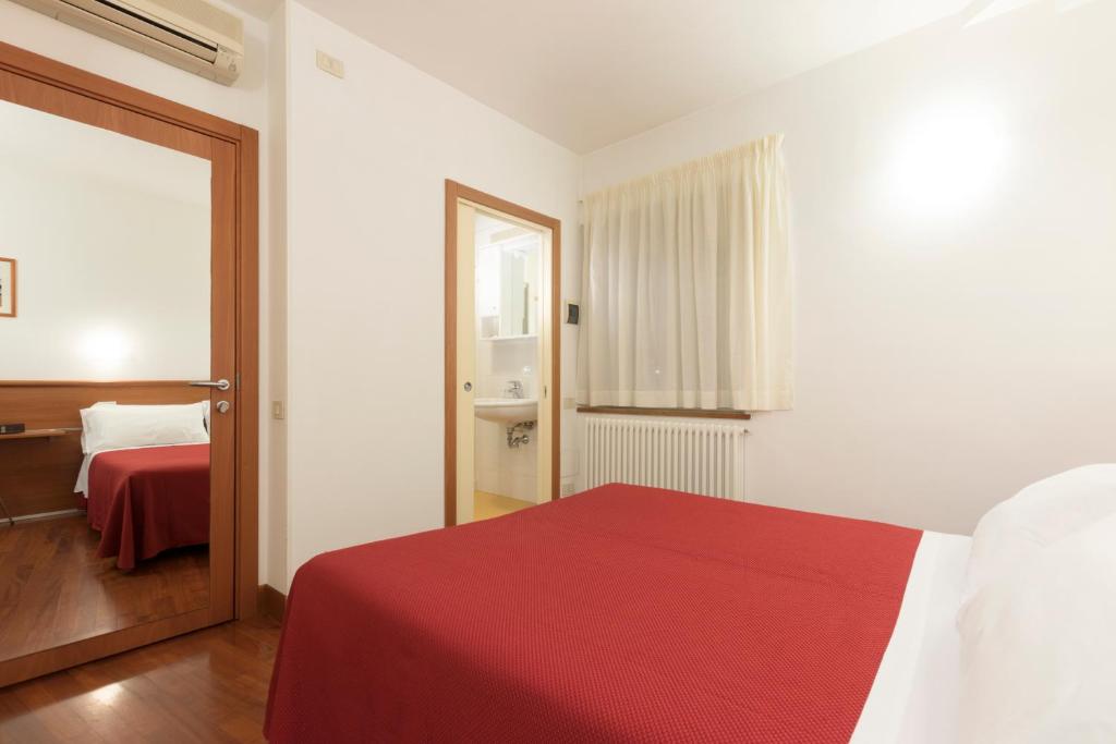 Postel nebo postele na pokoji v ubytování B&B Morelli