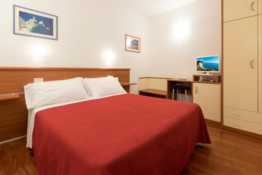 Postel nebo postele na pokoji v ubytování B&B Morelli
