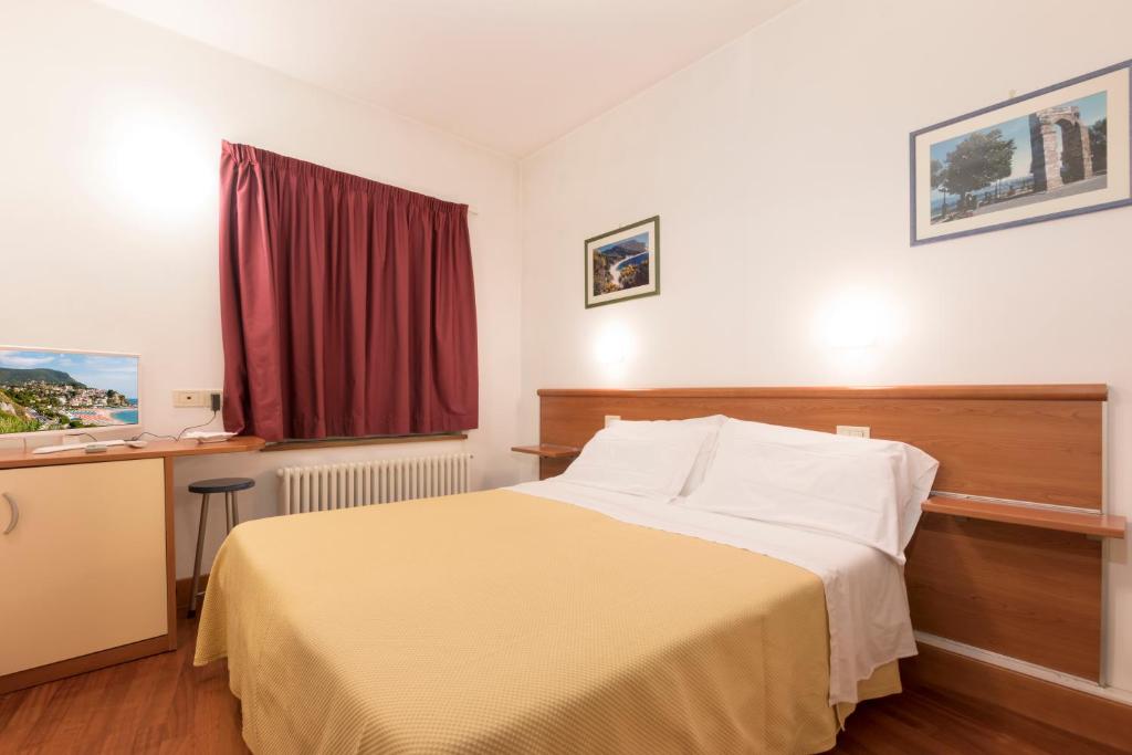 Postel nebo postele na pokoji v ubytování B&B Morelli