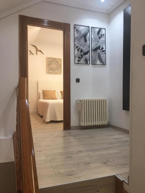 Postel nebo postele na pokoji v ubytování Claustro Las Francesas siglo XV