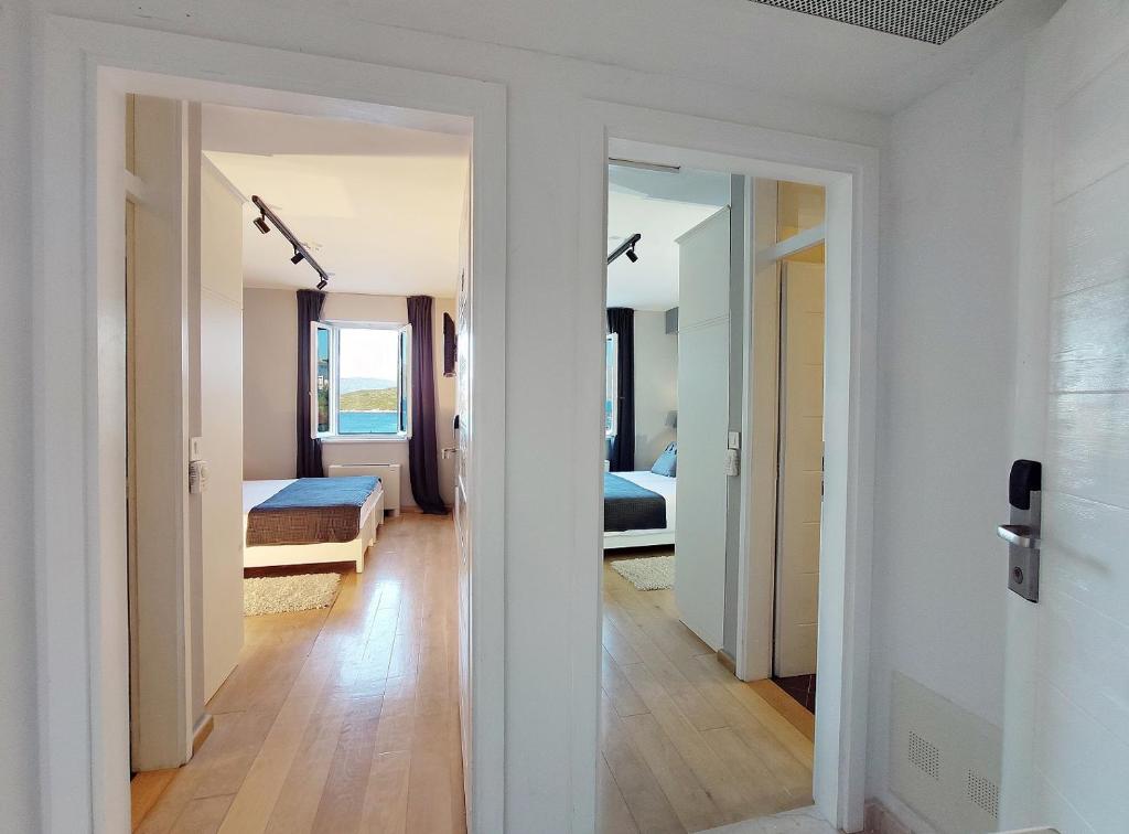 Postel nebo postele na pokoji v ubytování Hotel Korsal