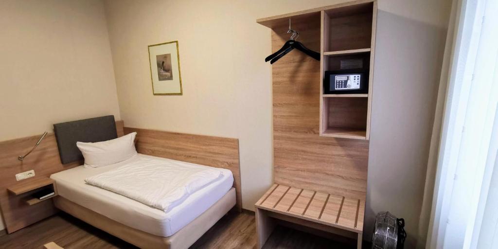 Postel nebo postele na pokoji v ubytování Zum Winzermännle