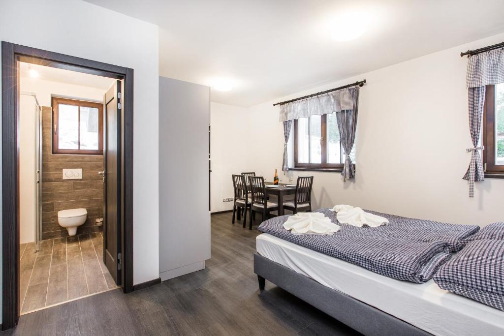 Voodi või voodid majutusasutuse Apartmány Nová Salaš toas
