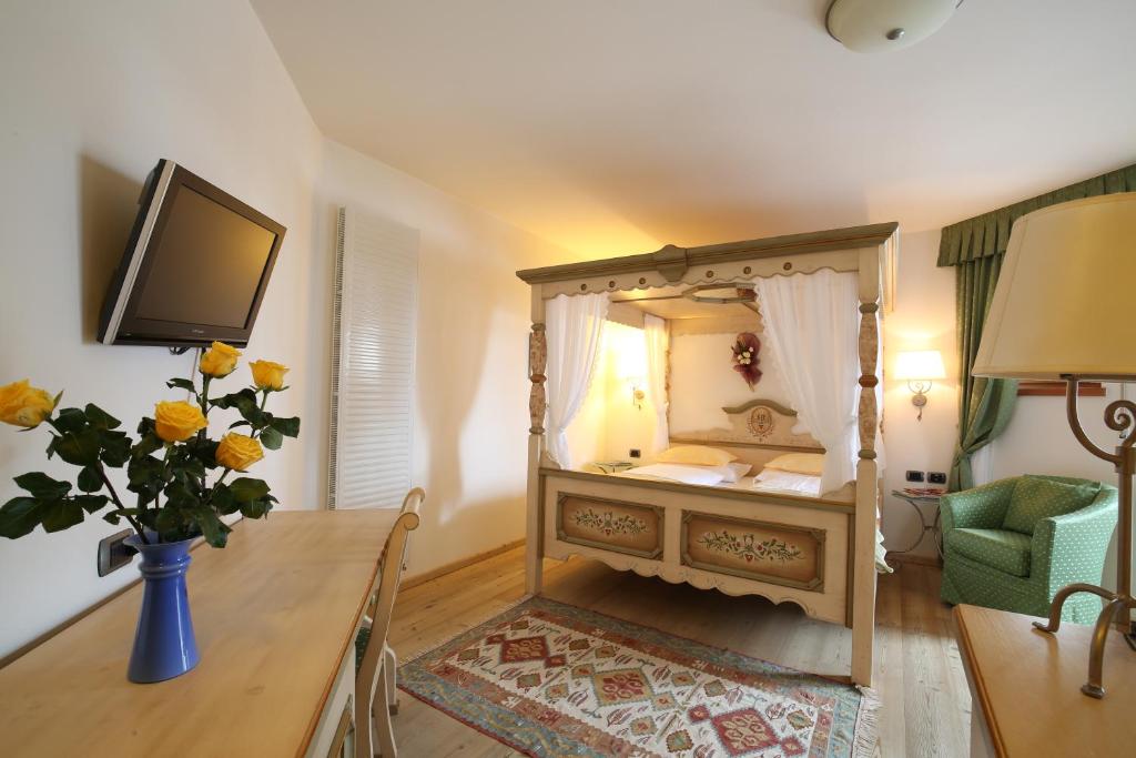 Postel nebo postele na pokoji v ubytování Hotel Mesdi