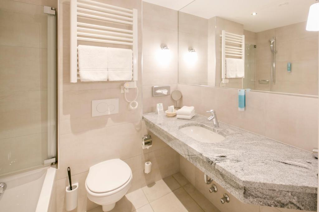 Koupelna v ubytování Hotel Sailer