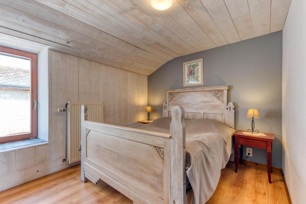 Postel nebo postele na pokoji v ubytování Château Ferme de Laval