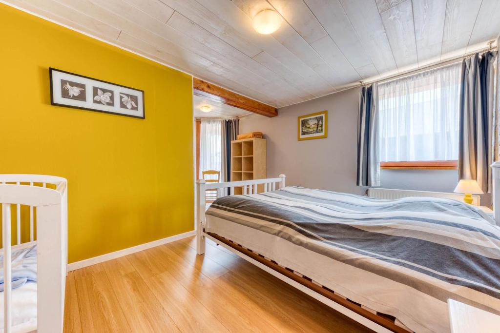 Postel nebo postele na pokoji v ubytování Château Ferme de Laval