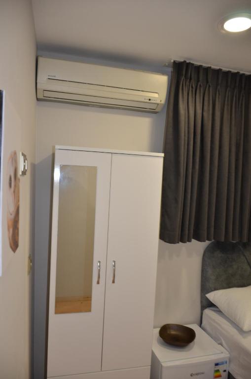 Postel nebo postele na pokoji v ubytování Rodion Hotel