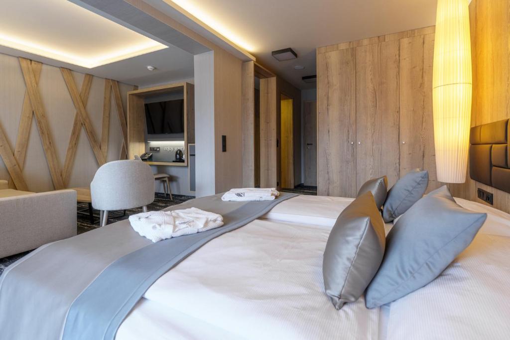 Postel nebo postele na pokoji v ubytování Hotel Hills