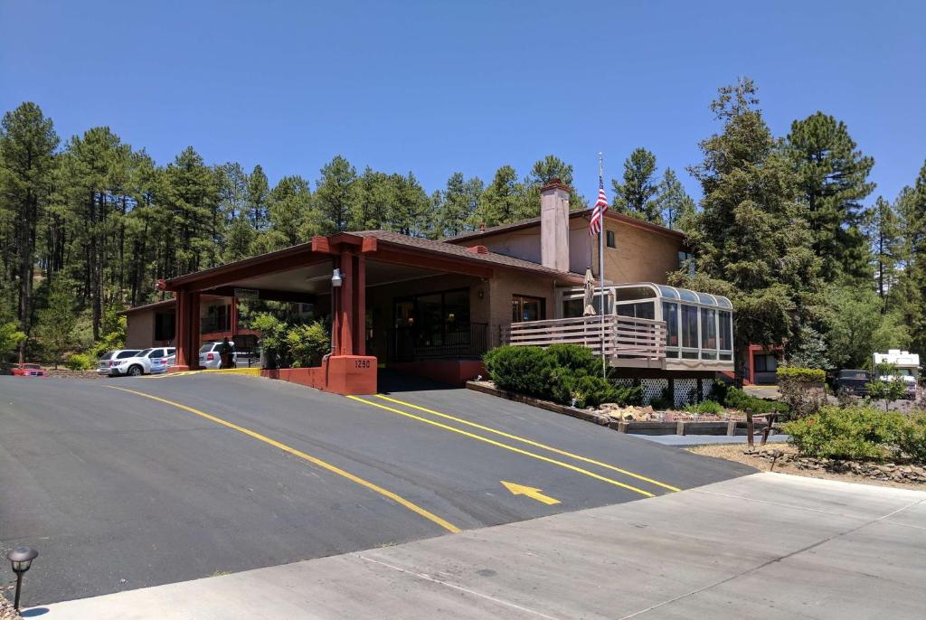 a building with a parking lot in front of it at Days Inn by Wyndham Prescott in Prescott