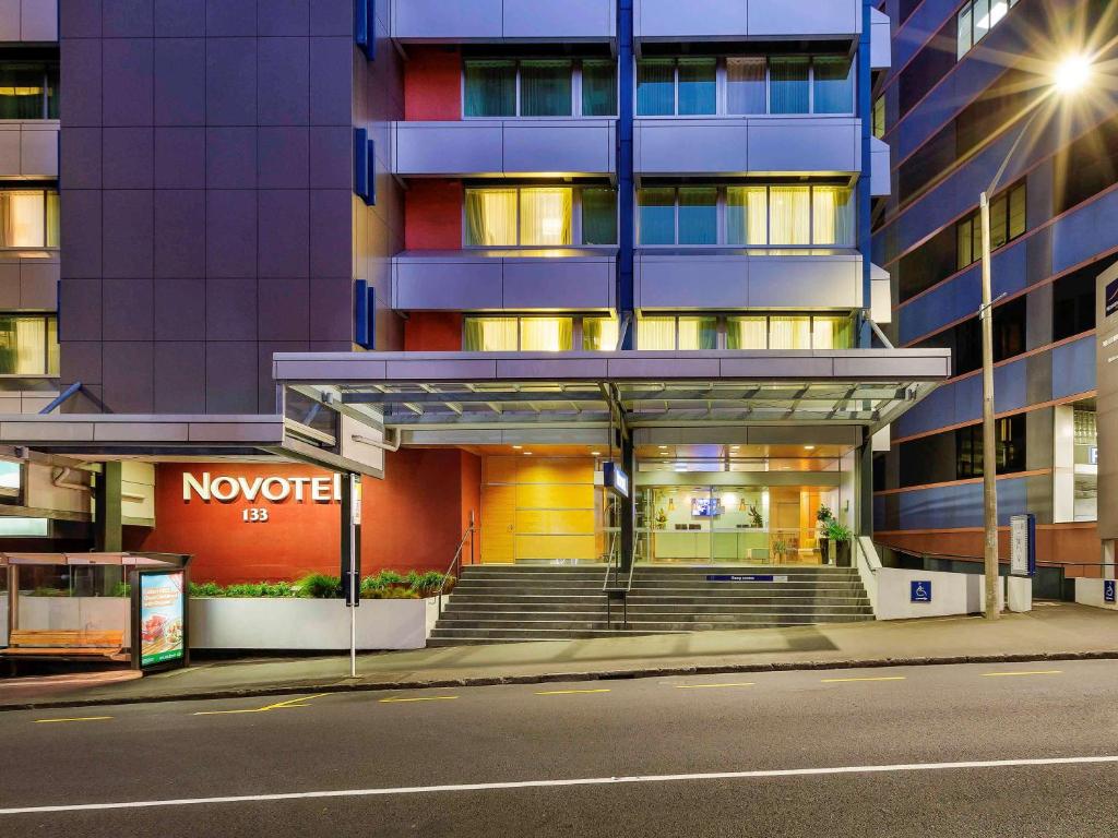 a building with stairs in front of a building at Novotel Wellington in Wellington