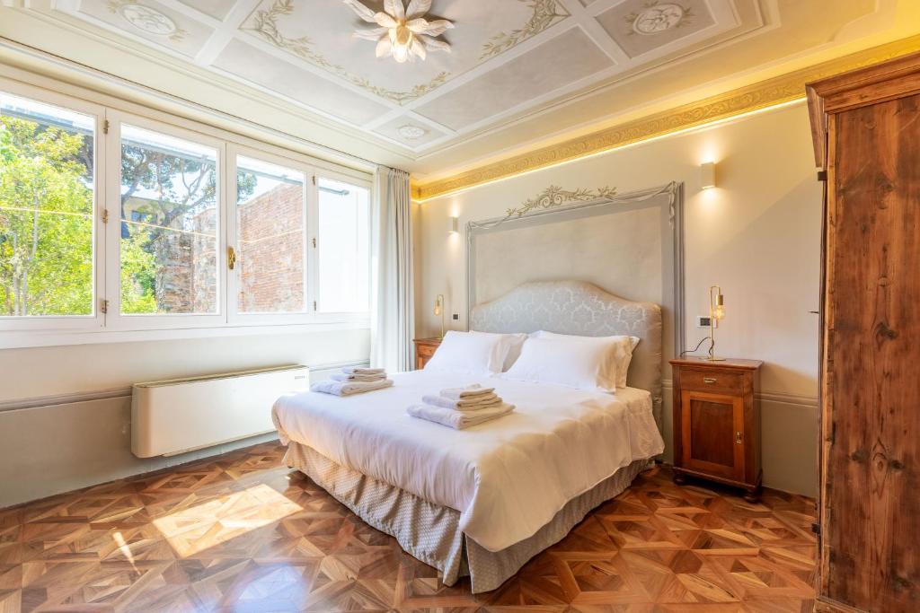Łóżko lub łóżka w pokoju w obiekcie Villa Tortorelli