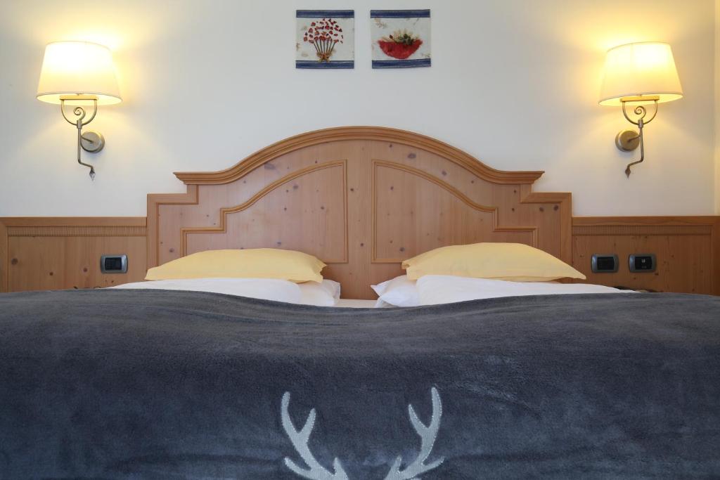 Postel nebo postele na pokoji v ubytování Hotel Mesdi