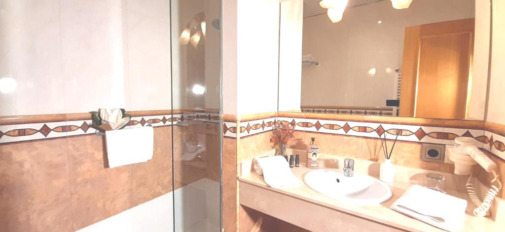 Koupelna v ubytování Hotel Nueva Plaza