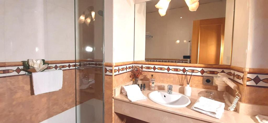 Koupelna v ubytování Hotel Nueva Plaza