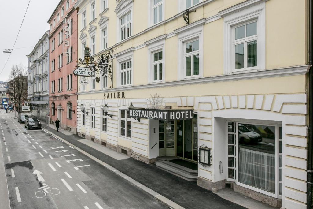 a street view of akritaan hotel on a city street at Hotel Sailer in Innsbruck