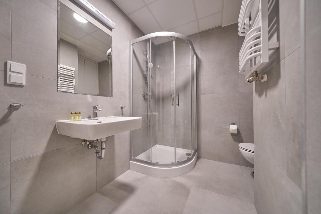 Kúpeľňa v ubytovaní Apartamenty Collegia