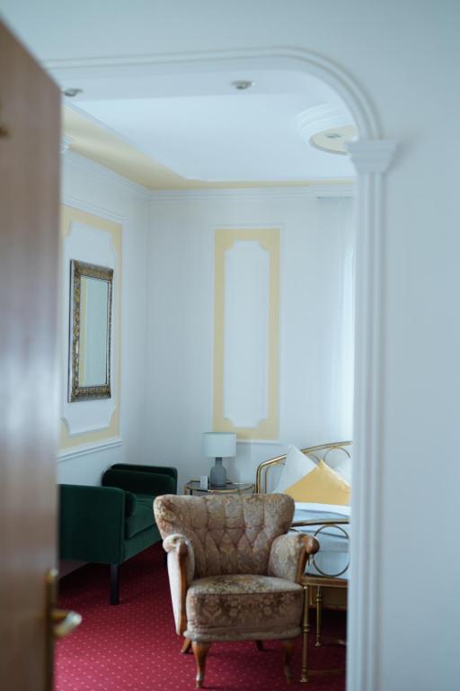 Een zitgedeelte bij Romantic-Pension Albrecht - since 1901