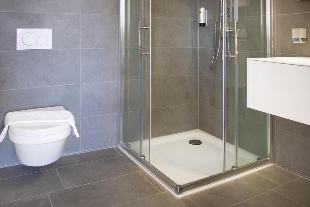 Koupelna v ubytování KU Hotel by WMM Hotels