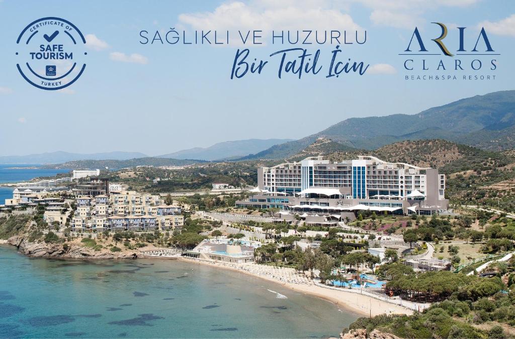 een uitzicht op het strand en het resort bij Aria Claros Beach & Spa Resort – All Inclusive 24H in Ozdere